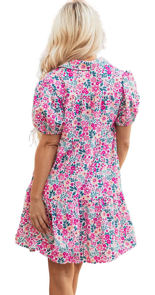 LuckeLadybug pink floral collared dress on model shown from back with puff sleeves tiered skirt and above knee hem