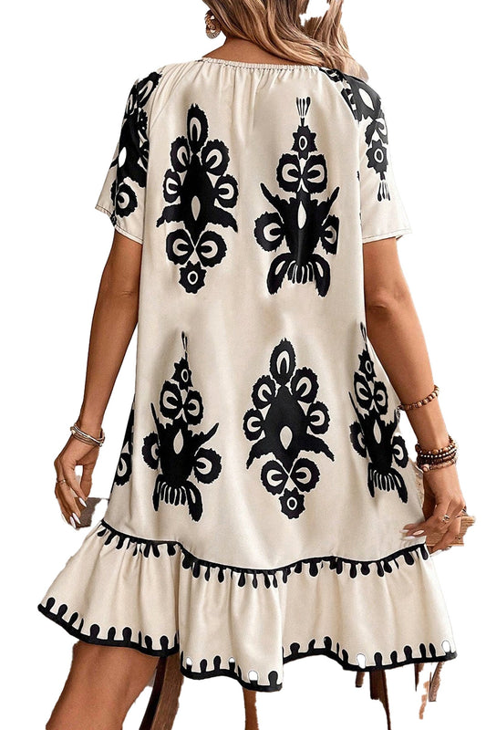 LuckeLadybug apricot western print dress with black floral designs and ruffled hem