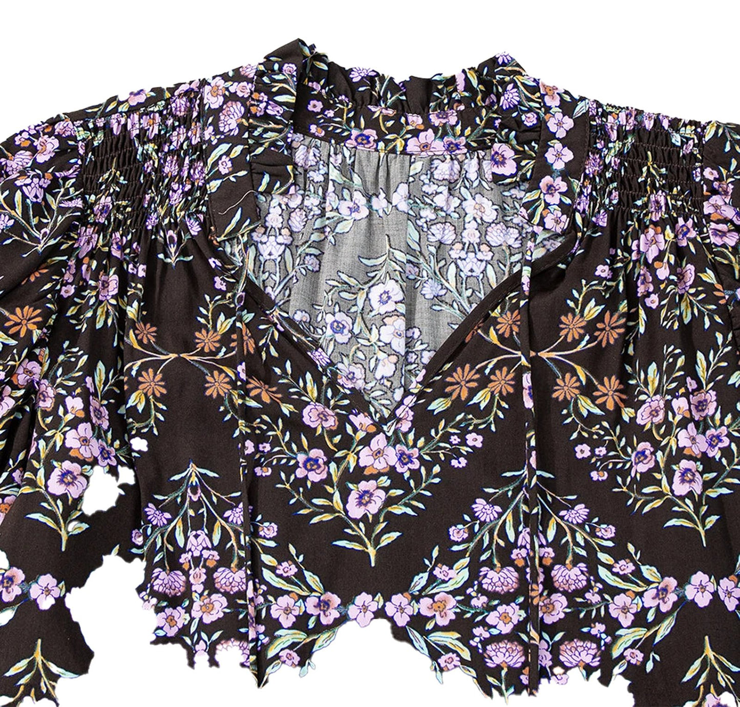 LuckeLadybug boho floral sleeveless blouse in black with bright floral patterns and a stylish neckline