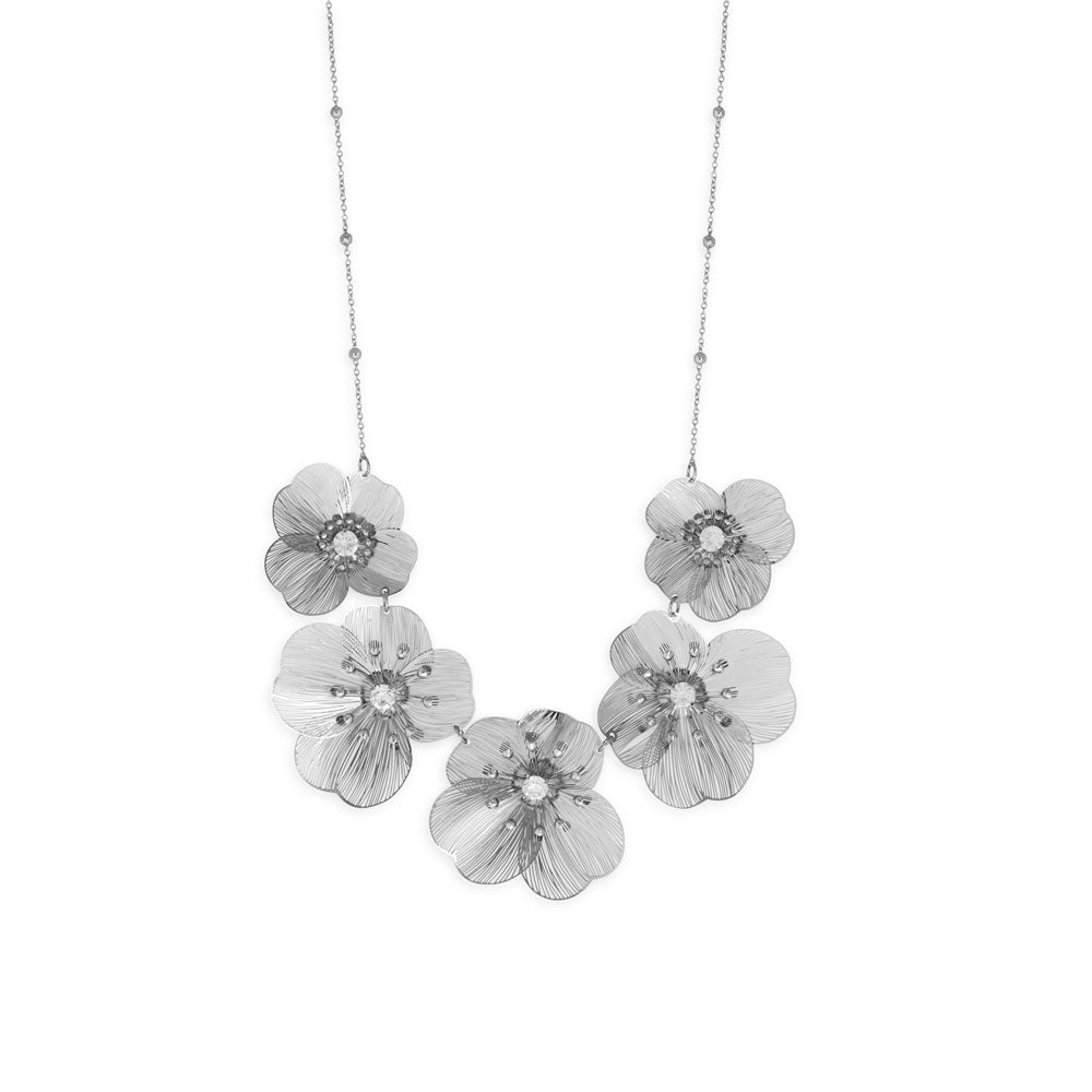 LuckeLadybug LLC crystal flower statement necklace featuring large silver flower charms with sparkling details