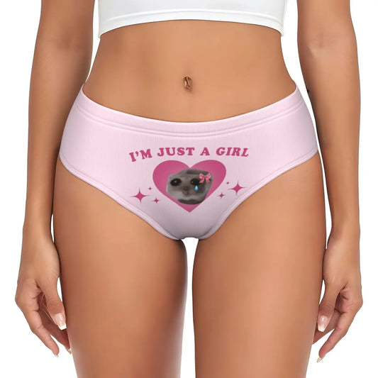 Cute women's underwear briefs with a pink heart design and the text I'm Just a Girl