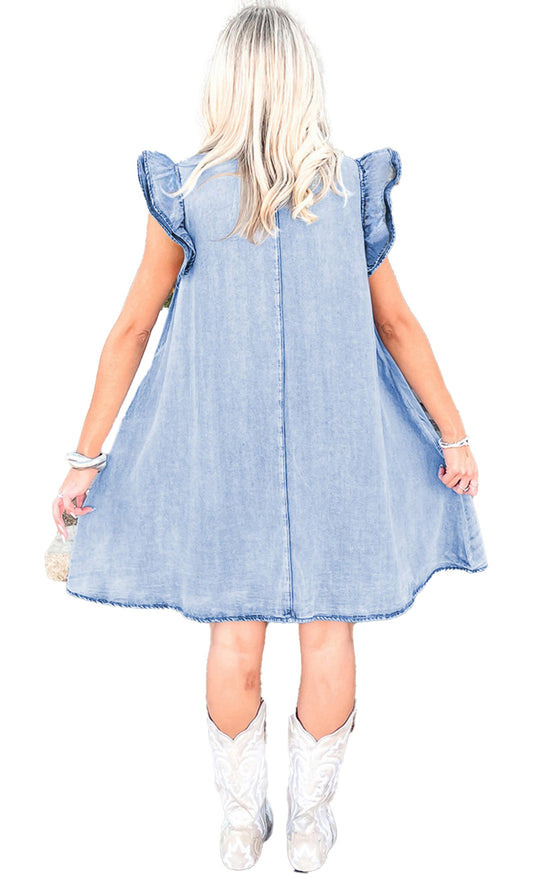 Back view of a model wearing a double ruffle sleeve denim dress with a flowy silhouette
