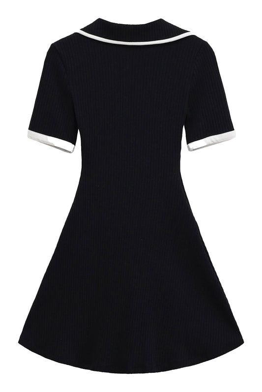 Back view of an elegant mini dress for women in navy with white collar and sleeve accents