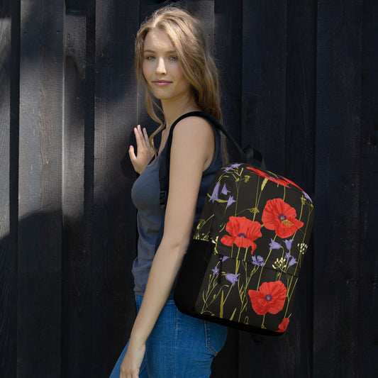 LuckeLadybug floral backpack for women with red and purple flowers on black background worn by woman