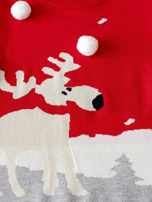 Girls Christmas deer sweater in red and gray featuring a playful reindeer design and pom-pom accents
