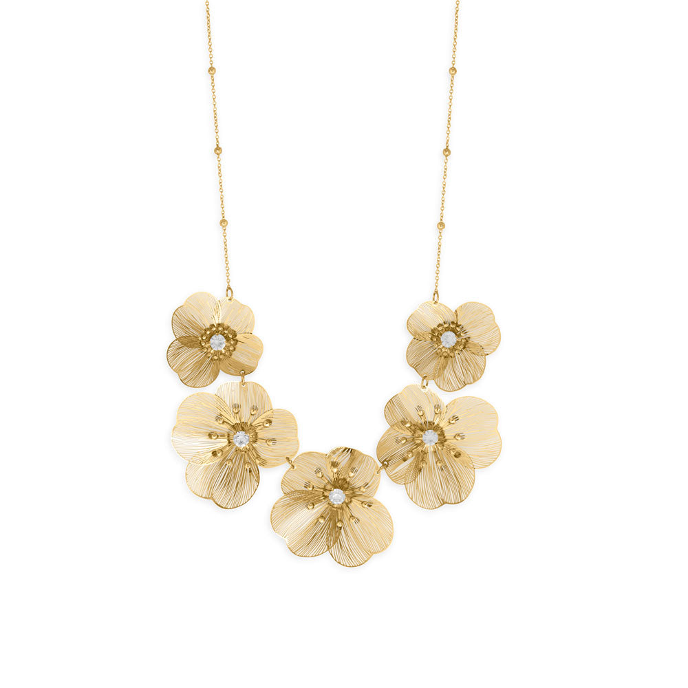 Gold flower statement necklace featuring five intricate flowers with shimmering accents