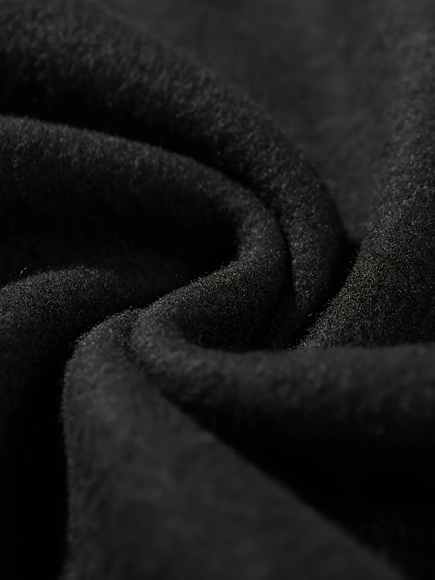 Close-up of soft black fabric showcasing the comfort of a hockey mom hoodie