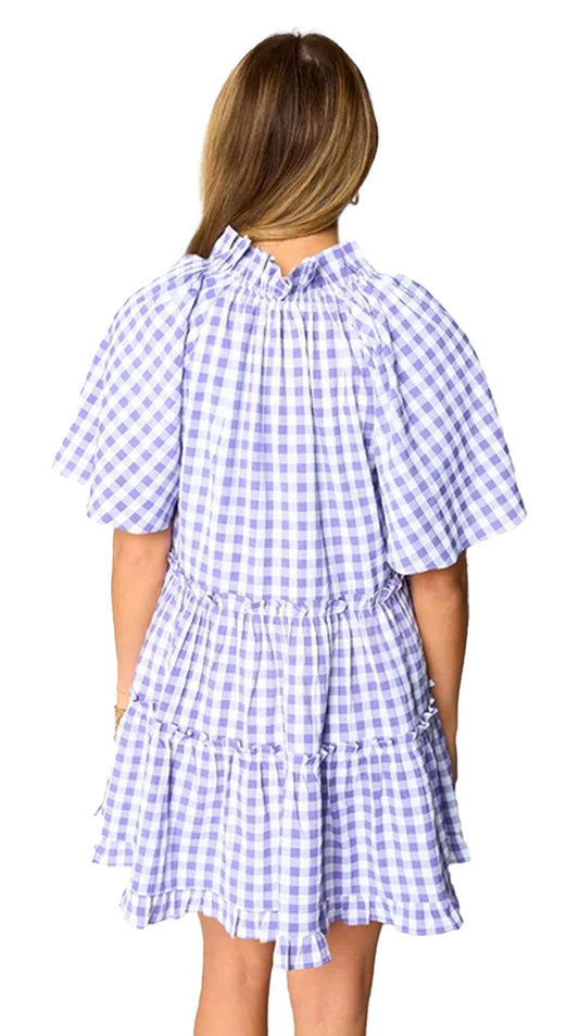 Back view of the lavender plaid babydoll dress with puff sleeves and tiered design