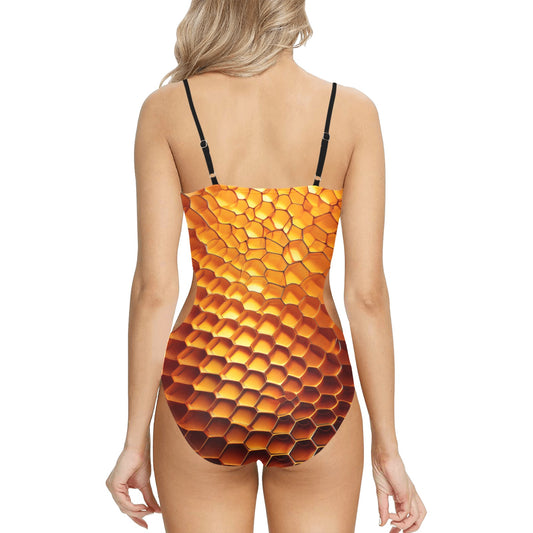 Back view of LuckeLadybug beehive print one-piece swimsuit with honeycomb pattern and adjustable black straps
