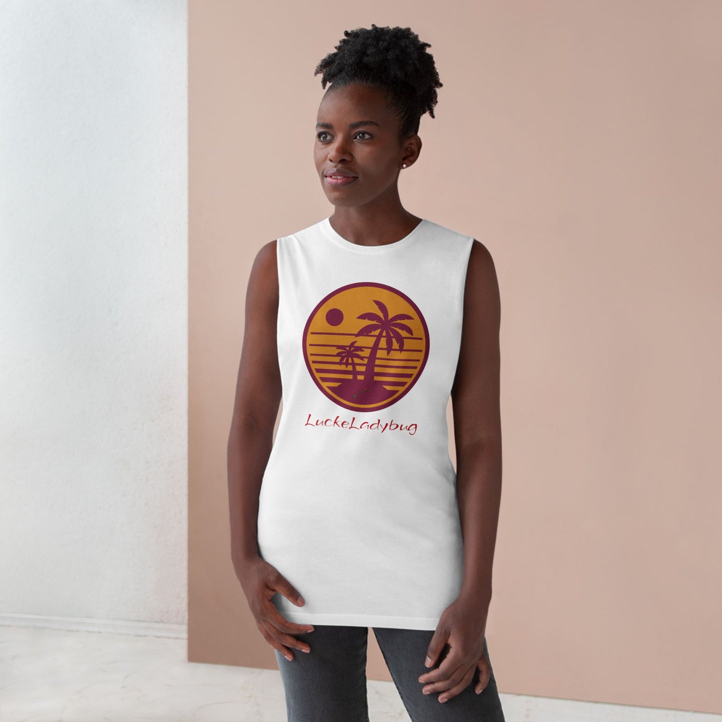 LuckeLadybug trendy palm tree graphic tank in white worn by woman with palm tree and sun design