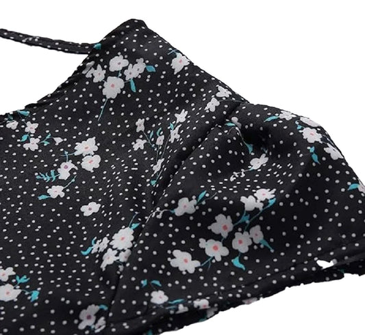 LuckeLadybug mini floral dress for women with a black background and delicate white flowers