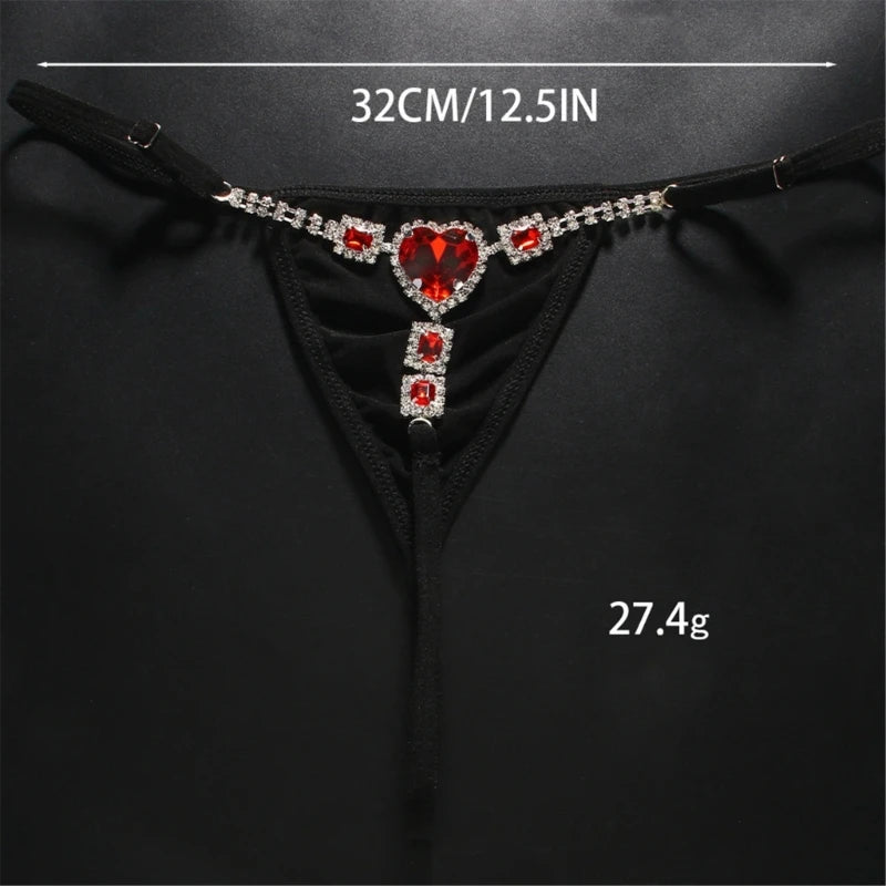 Rhinestone low rise thongs for women featuring a heart-shaped gem and elegant design