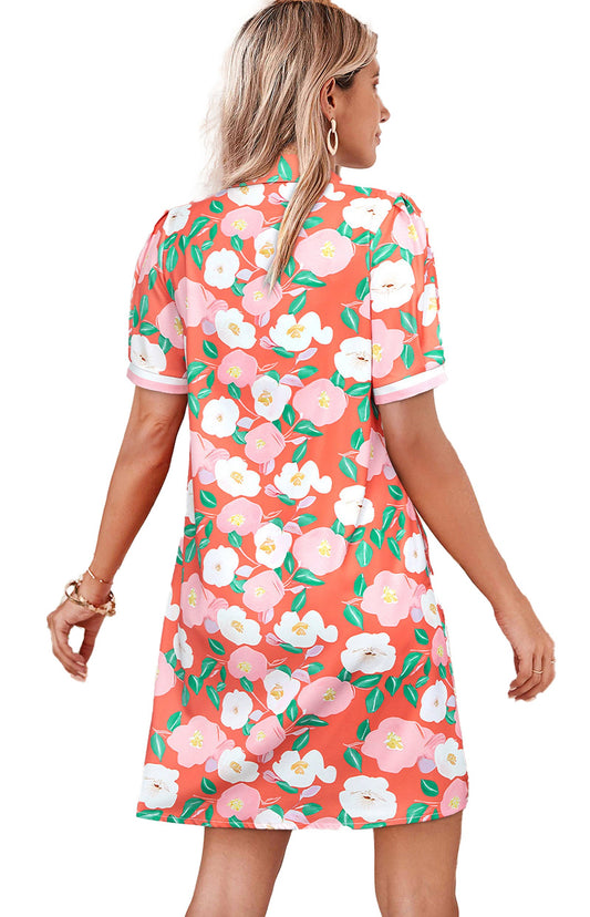Salmon floral polo dress with vibrant flower patterns, perfect for casual outings and summer wear