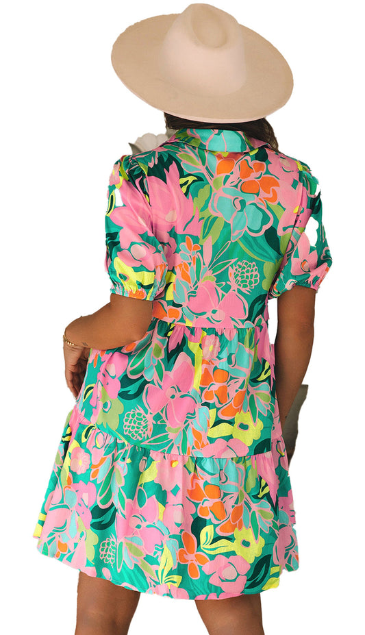 LuckeLadybug A Line green floral babydoll dress back view showing puff sleeves tiered skirt and white wide brim hat
