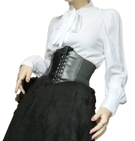 Stylish women's leather corset belt with lace-up front and flattering design for enhanced waistline