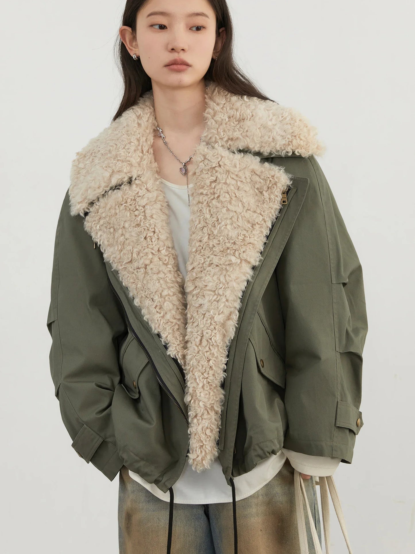 Women's retro motorcycle jacket with a fluffy collar in green, perfect for stylish layering