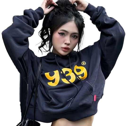 Women's streetwear hoodie in navy with bold yellow graphic logo and cropped design for casual style