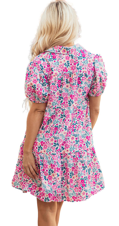 LuckeLadybug pink floral collared dress on model shown from back with puff sleeves tiered skirt and above knee hem