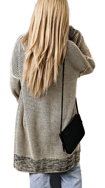 Back view of a gray plaid open front cardigan styled with a black crossbody bag