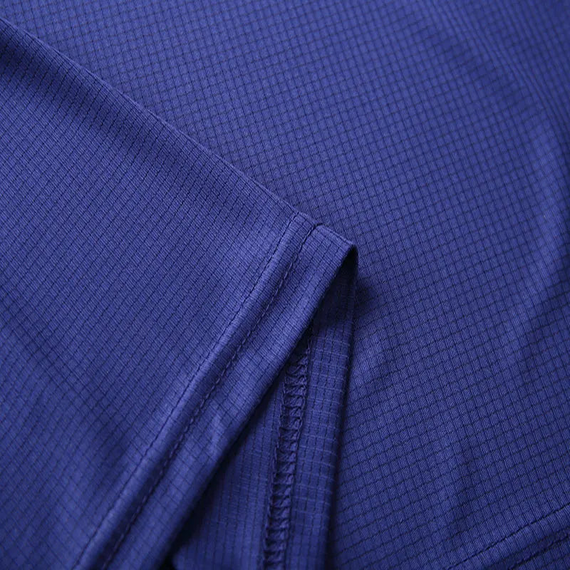Close-up of a purple men's quick dry polo shirt fabric, showcasing its soft texture and breathable design