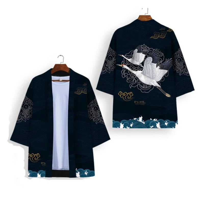 Navy blue kimono with crane design on a white background