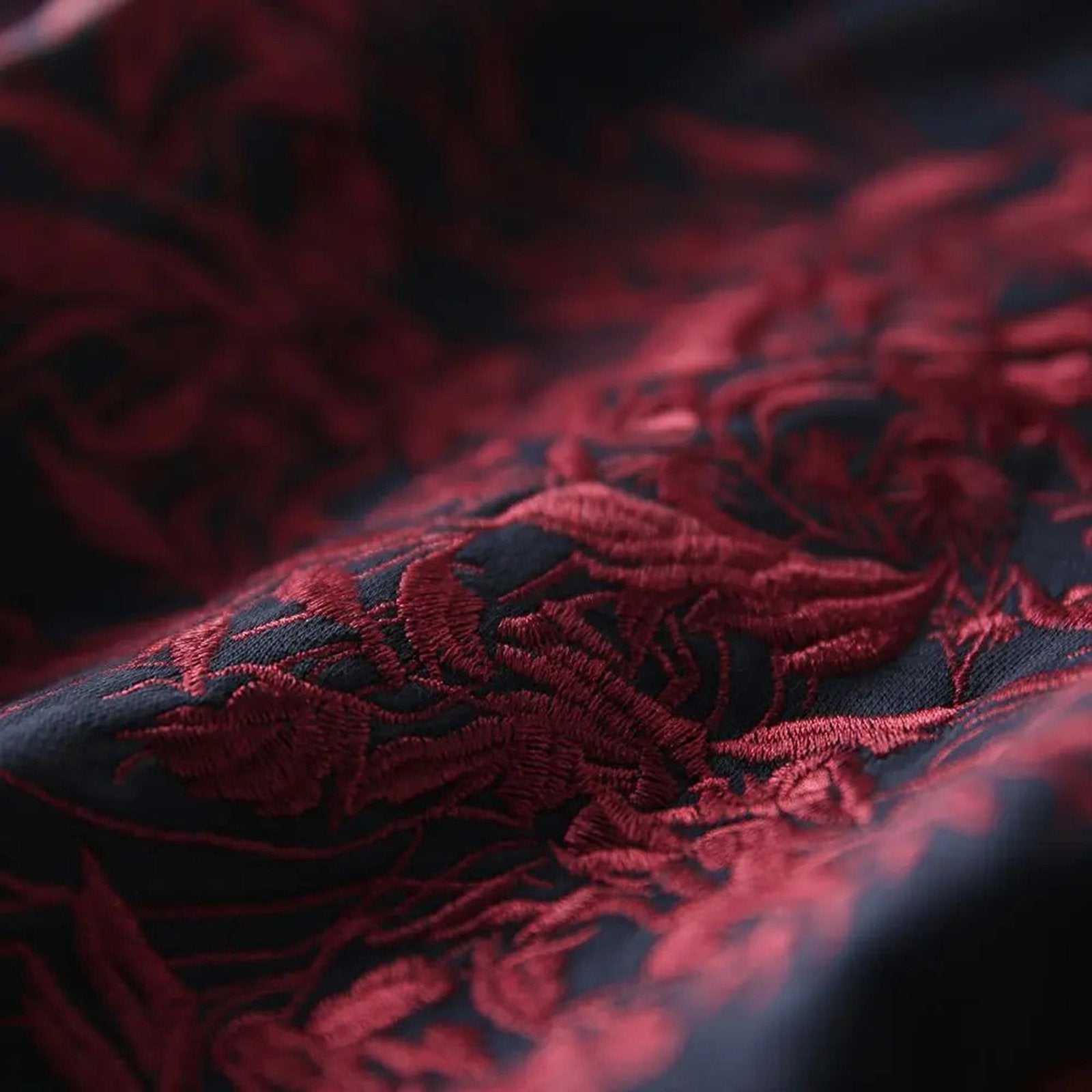 Close-up of luxurious embroidered graphic hoodie for women featuring intricate floral designs
