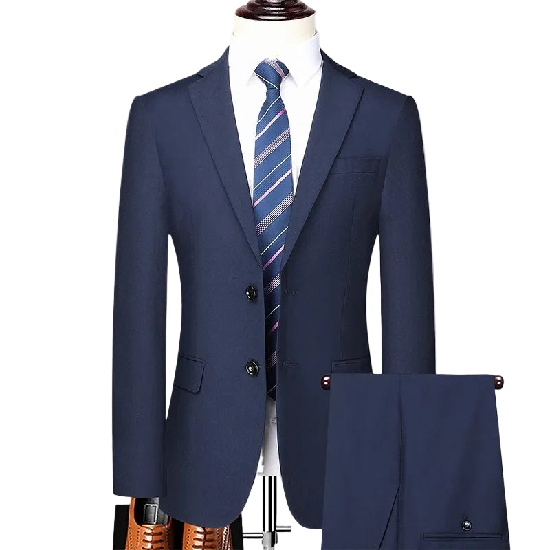 A men's navy blue suit displayed on a mannequin torso with a white dress shirt and blue striped tie, plus matching navy trousers shown at lower right on a white background.