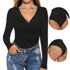 A woman wearing a fitted black long-sleeve wrap-style top with a deep V-neck, paired with blue jeans. Two circular inset close-ups on the right show the high-cut bikini-style bottom and side detail of the garment.