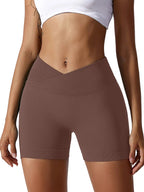 Brown high-waisted shorts worn by a person on a plain background
