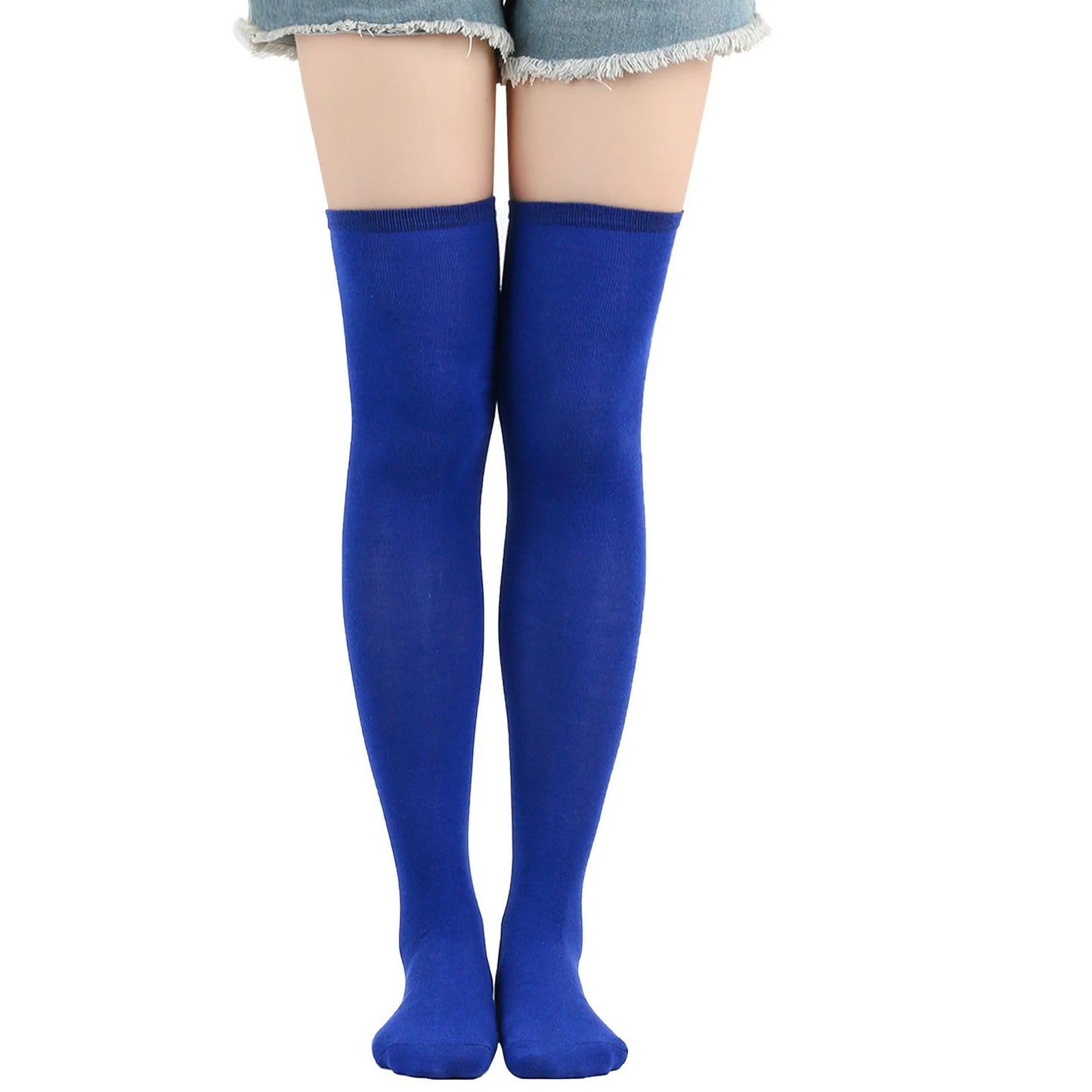Bright blue striped thigh high socks for women styled with denim shorts