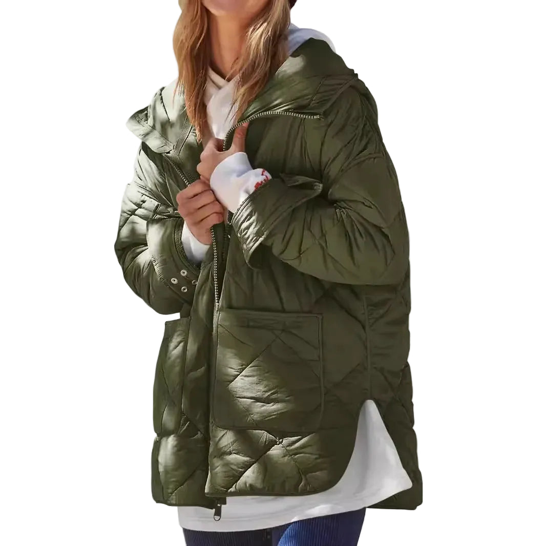 Green puffer jacket worn by a person on a white background