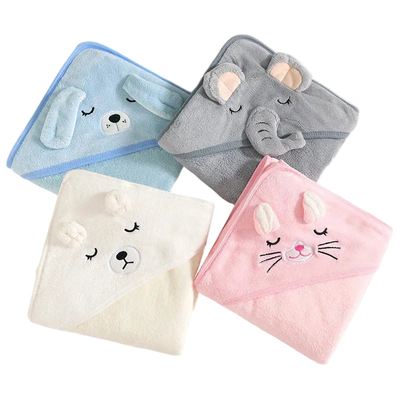 Four animal-themed hooded towels in blue, gray, white, and pink on a white background.