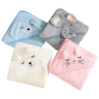 Four animal-themed hooded towels in blue, gray, white, and pink on a white background.