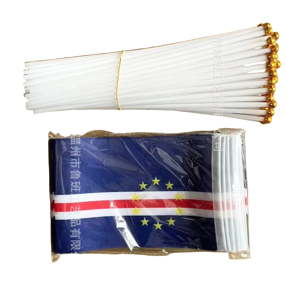 A bundle of white plastic zip ties with gold ball ends, shown above a packaged set of small flag stickers featuring a blue field with a red and white horizontal stripe and yellow stars, all on a brown background.