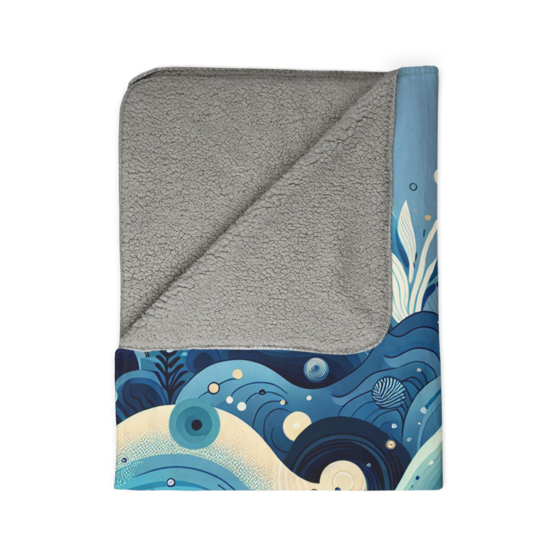 LuckeLadybug Sherpa Blanket with grey fleece interior and blue abstract design, an abstract fleece throw for winter