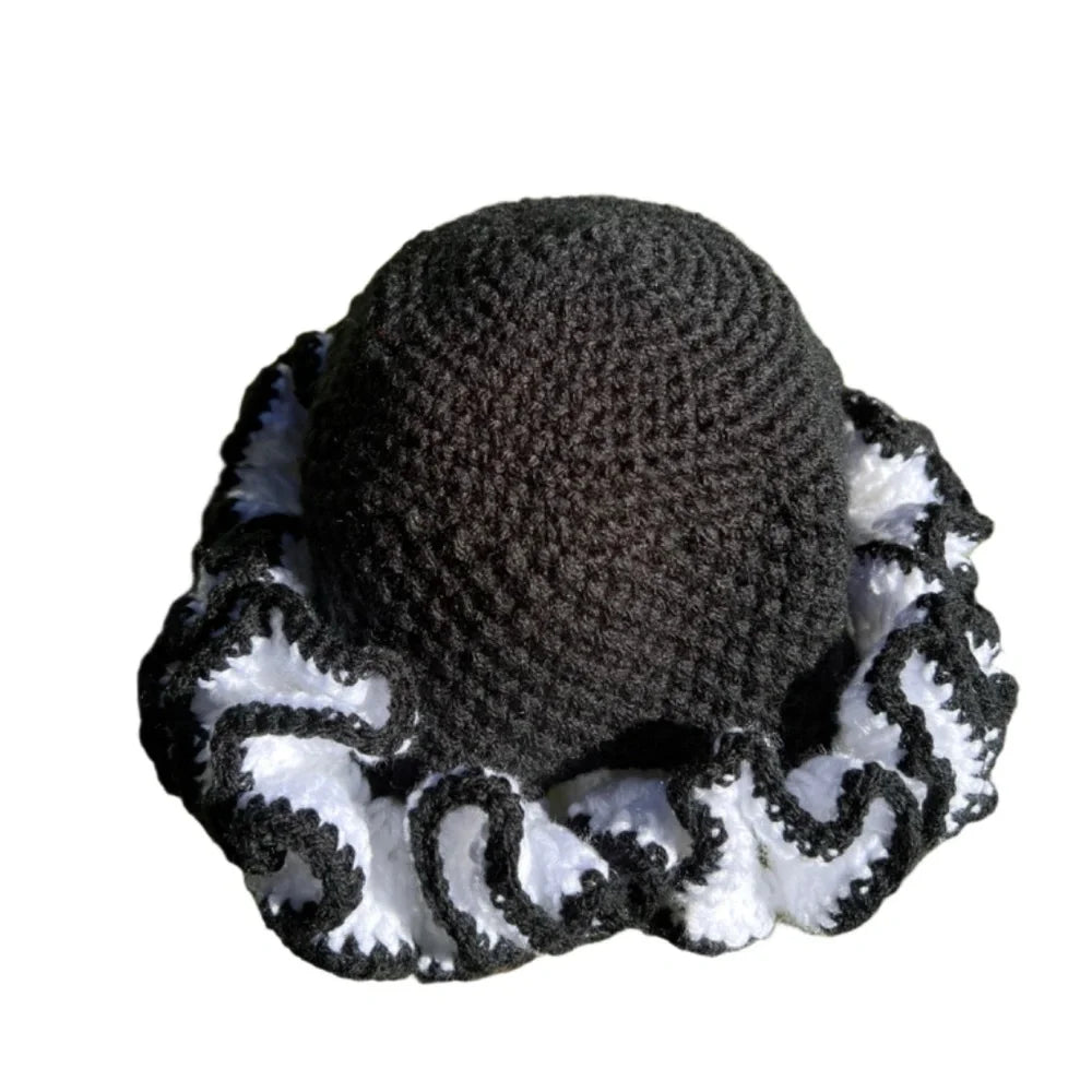 Handcrafted black and white ruffle african hat perfect for stylish and unique outfits