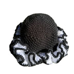 Handcrafted black and white ruffle african hat perfect for stylish and unique outfits
