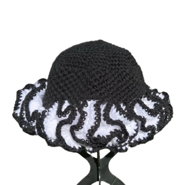 Trendy black and white ruffled African hat by ThreadsByHannah, perfect for stylish outdoor adventures