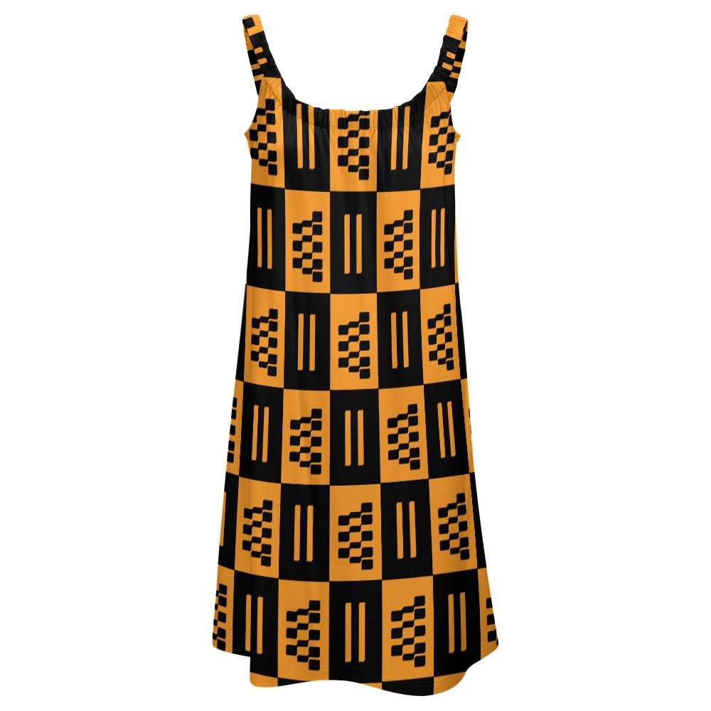 African print beach skirt styled as sleeveless orange and black checkered beach dress