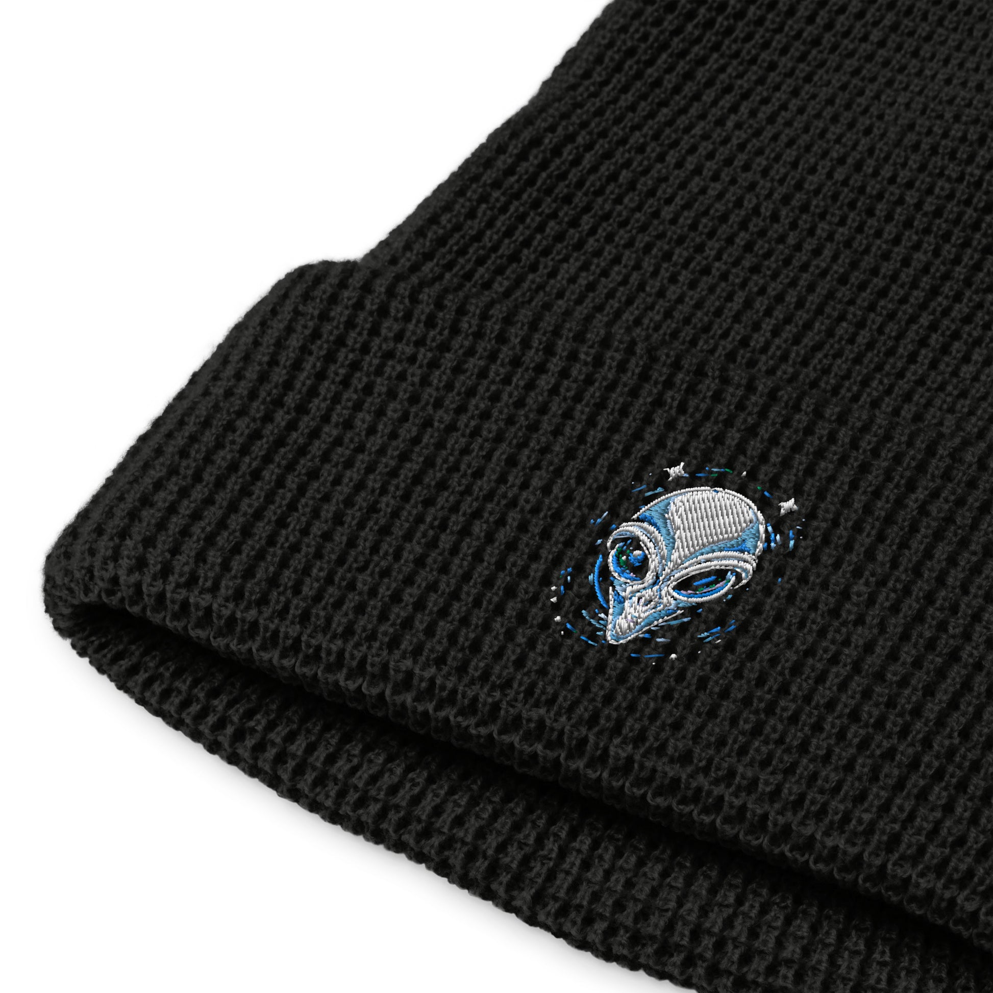 Black alien embroidery waffle beanie by LuckeLadybug with blue and silver alien face design
