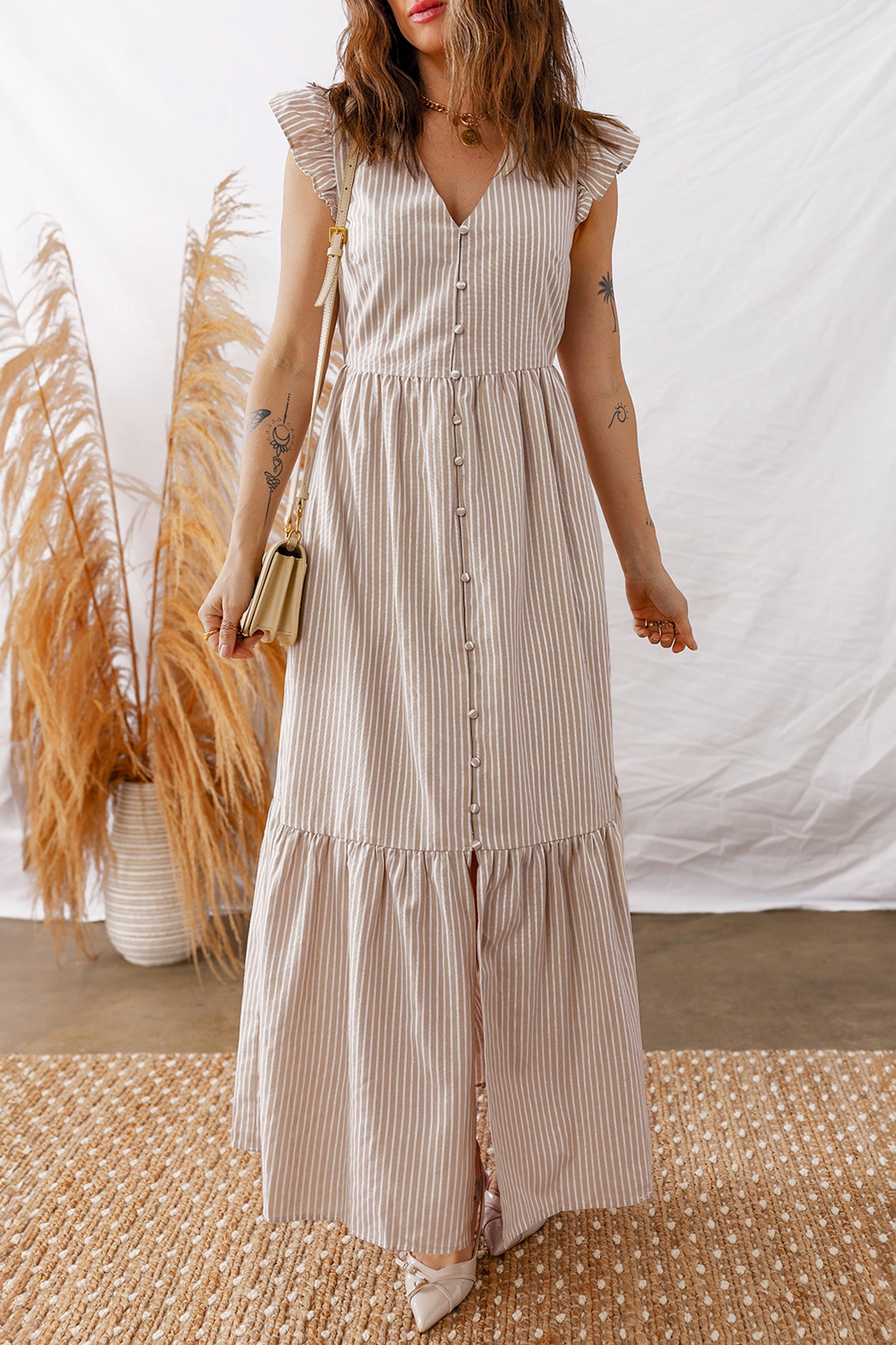 LuckeLadybug LLC Fit & Flare striped maxi dress with a button-down front and ruffle sleeves