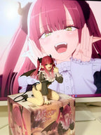 LuckeLadybug anime figure of a character with pink hair and devil-themed outfit standing on a box