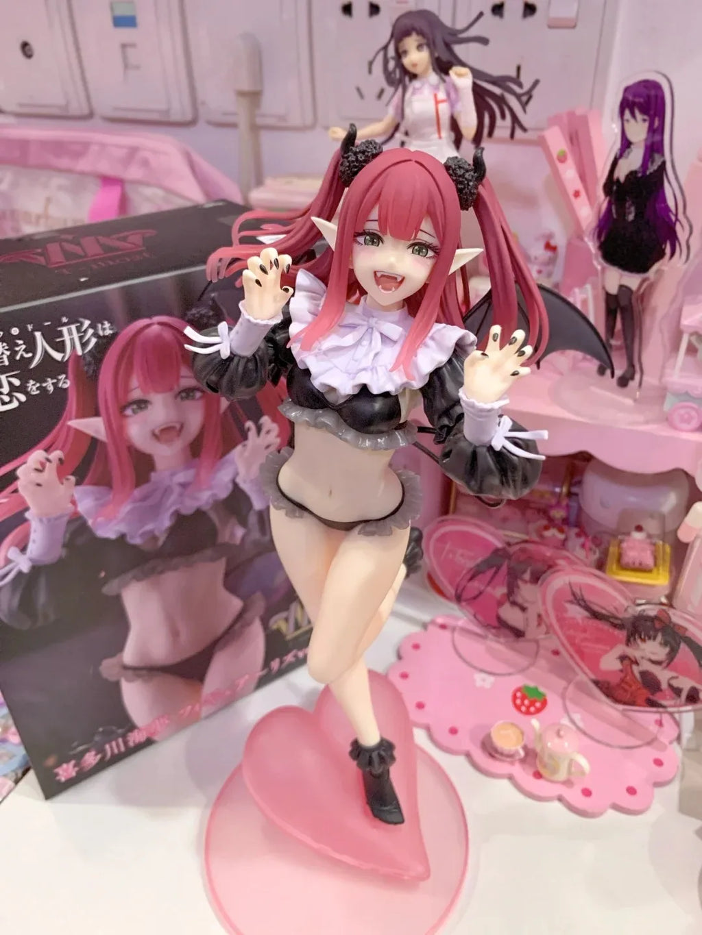 LuckeLadybug LLC anime figure of a character with pink hair and playful pose in a stylish outfit