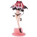 Anime figure of a character with red hair and wings, playfully posed on a pink heart base