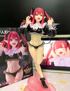 Anime figure of a red-haired character in a black outfit with a pink base and dynamic pose from LuckeLadybug LLC