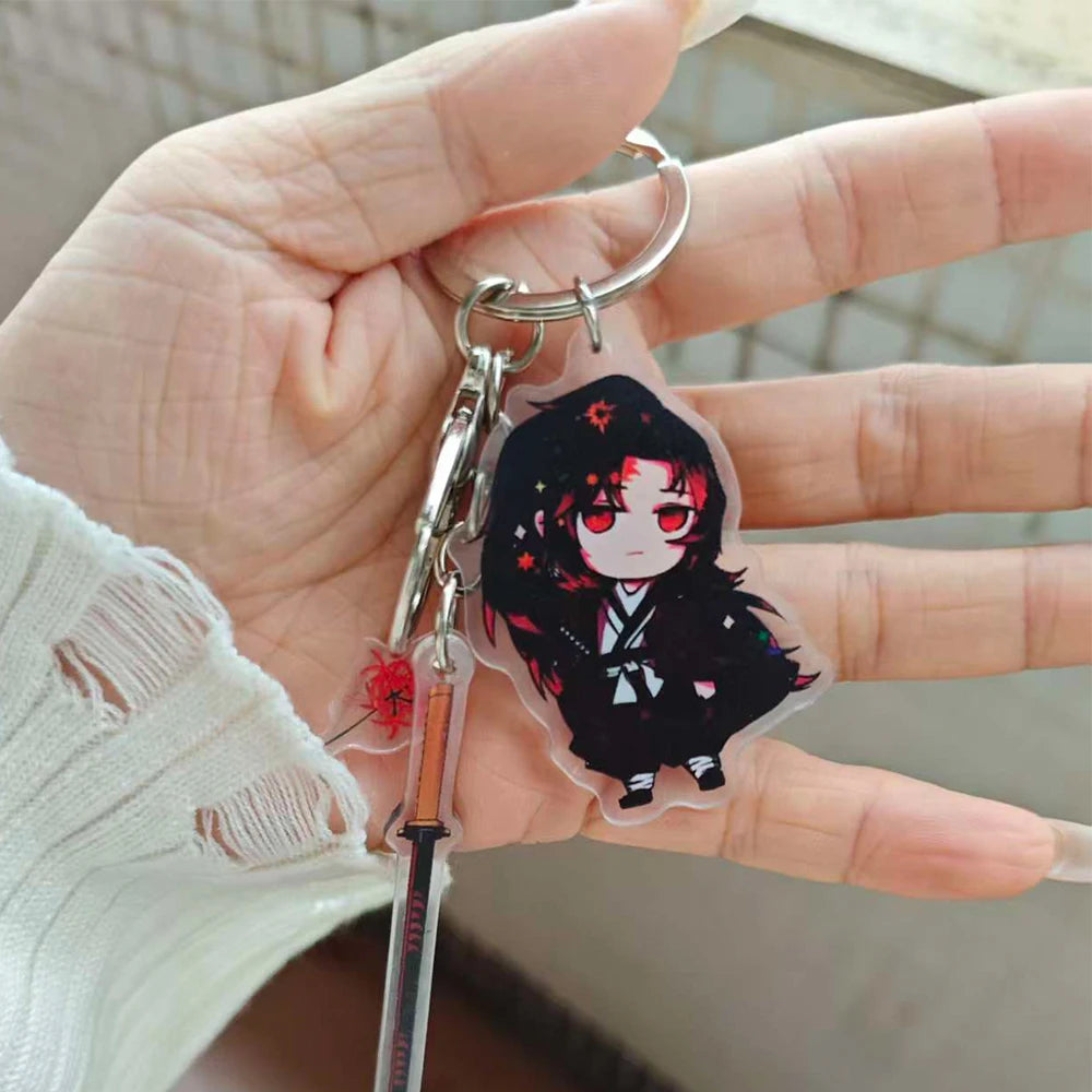 LuckeLadybug LLC anime figure keychain with a character in a black outfit and a sword