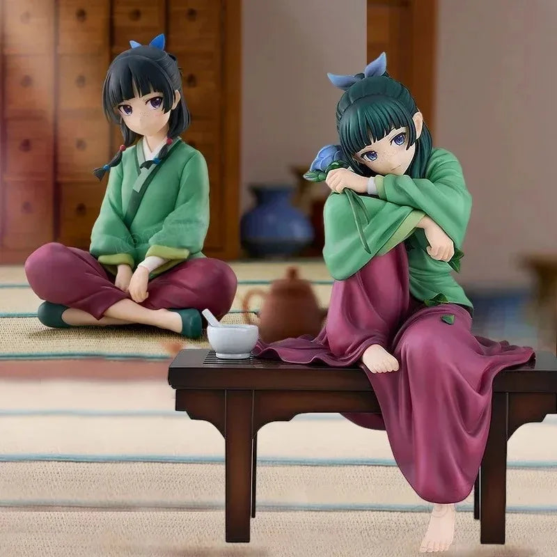 LuckeLadybug LLC anime figure of a seated girl in traditional attire with green and purple clothing