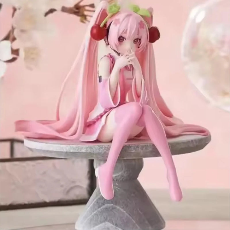 Anime figure of a pink-haired character sitting gracefully on a marble pedestal