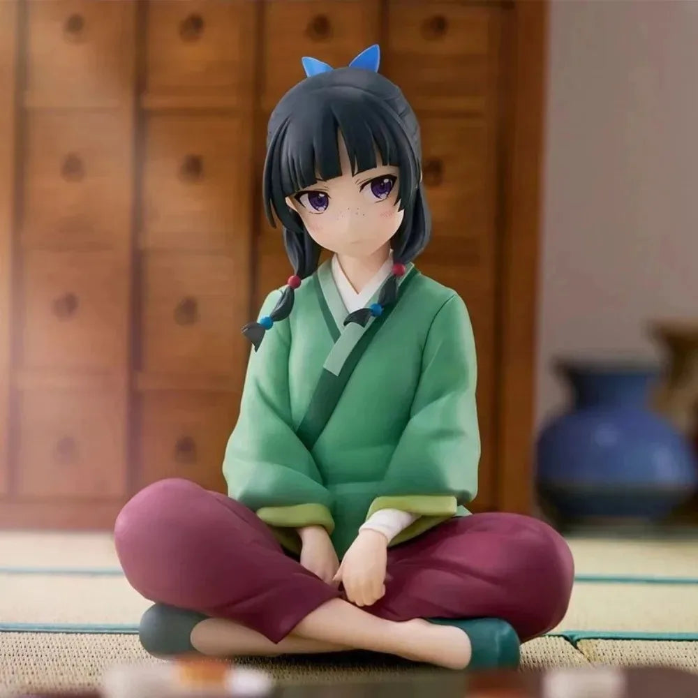 LuckeLadybug LLC anime figure of a girl sitting in a traditional setting with a thoughtful expression
