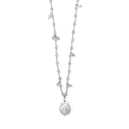 Aquamarine and freshwater pearl necklace with decorative beads and a large pendant for elegant style